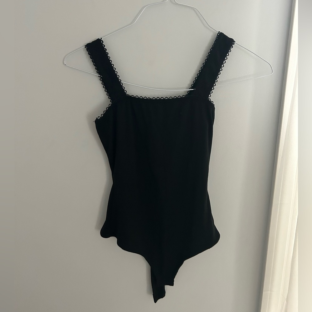 Black ribbed Bodysuit with detailing on top size XS